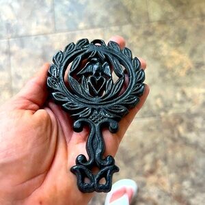 Antique, cast iron hot plate, trivet.